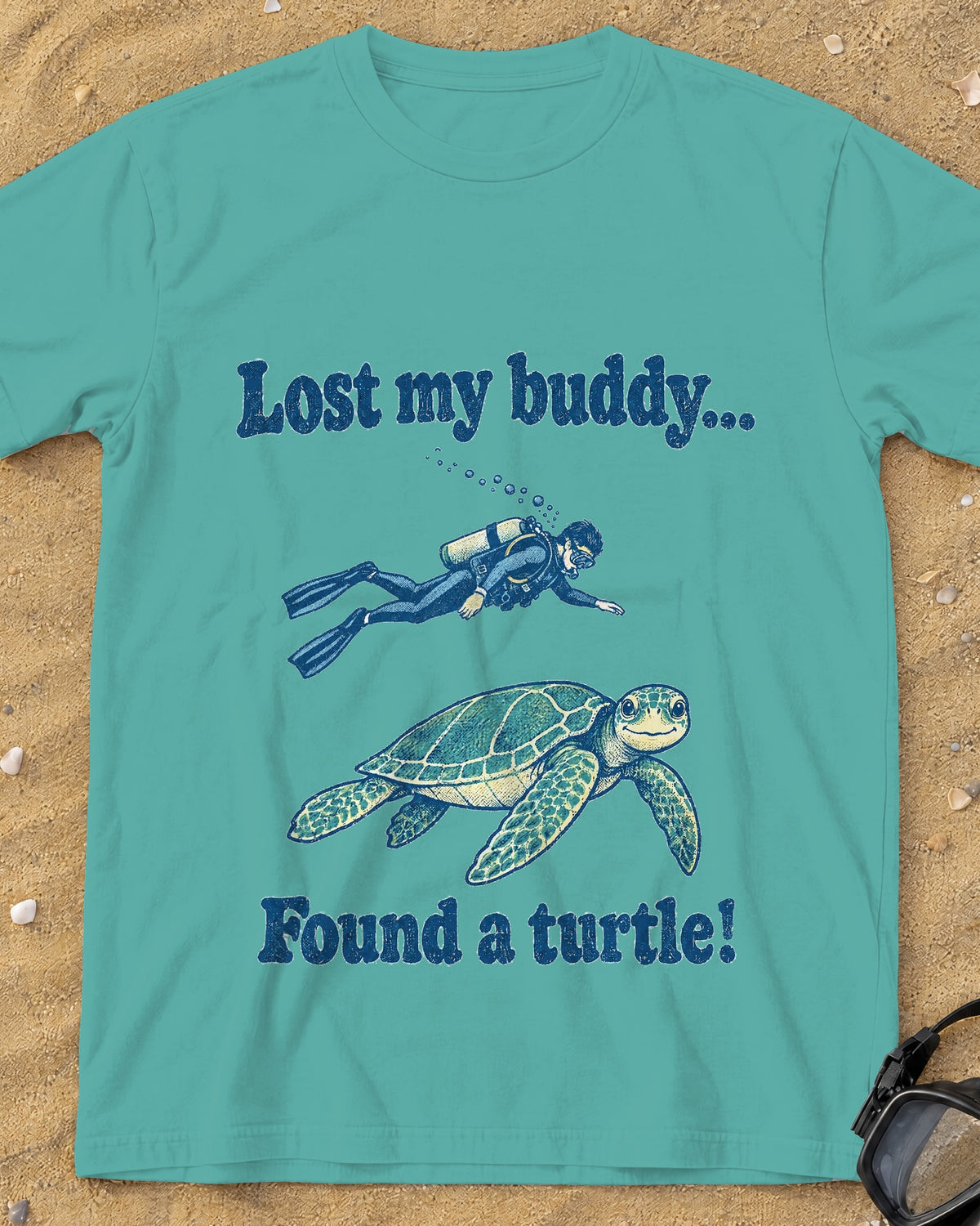 Chalky Mint Lost My Buddy. Found a Turtle! tee on a sandy beach