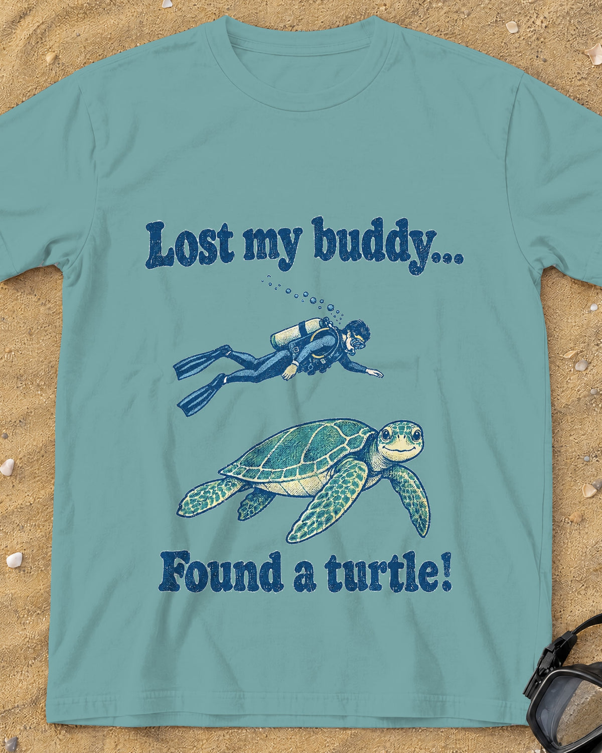 Seafoam Lost My Buddy. Found a Turtle! tee on a sandy beach