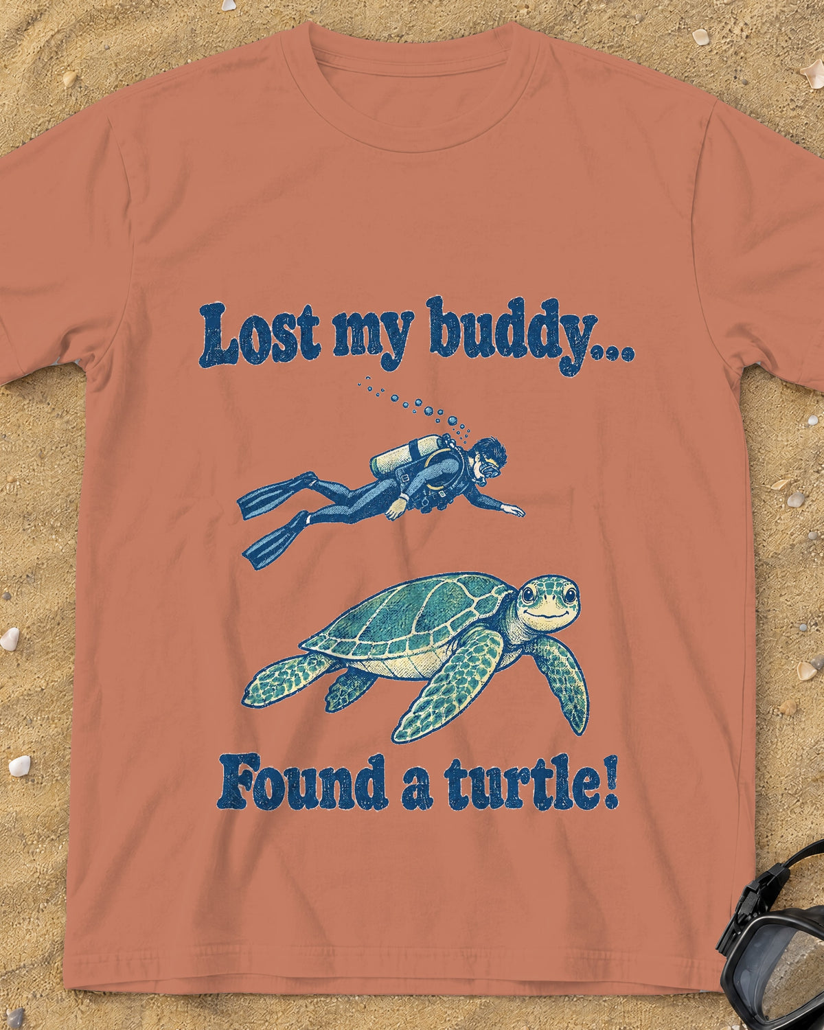 Terracotta Lost My Buddy. Found a Turtle! tee on a sandy beach