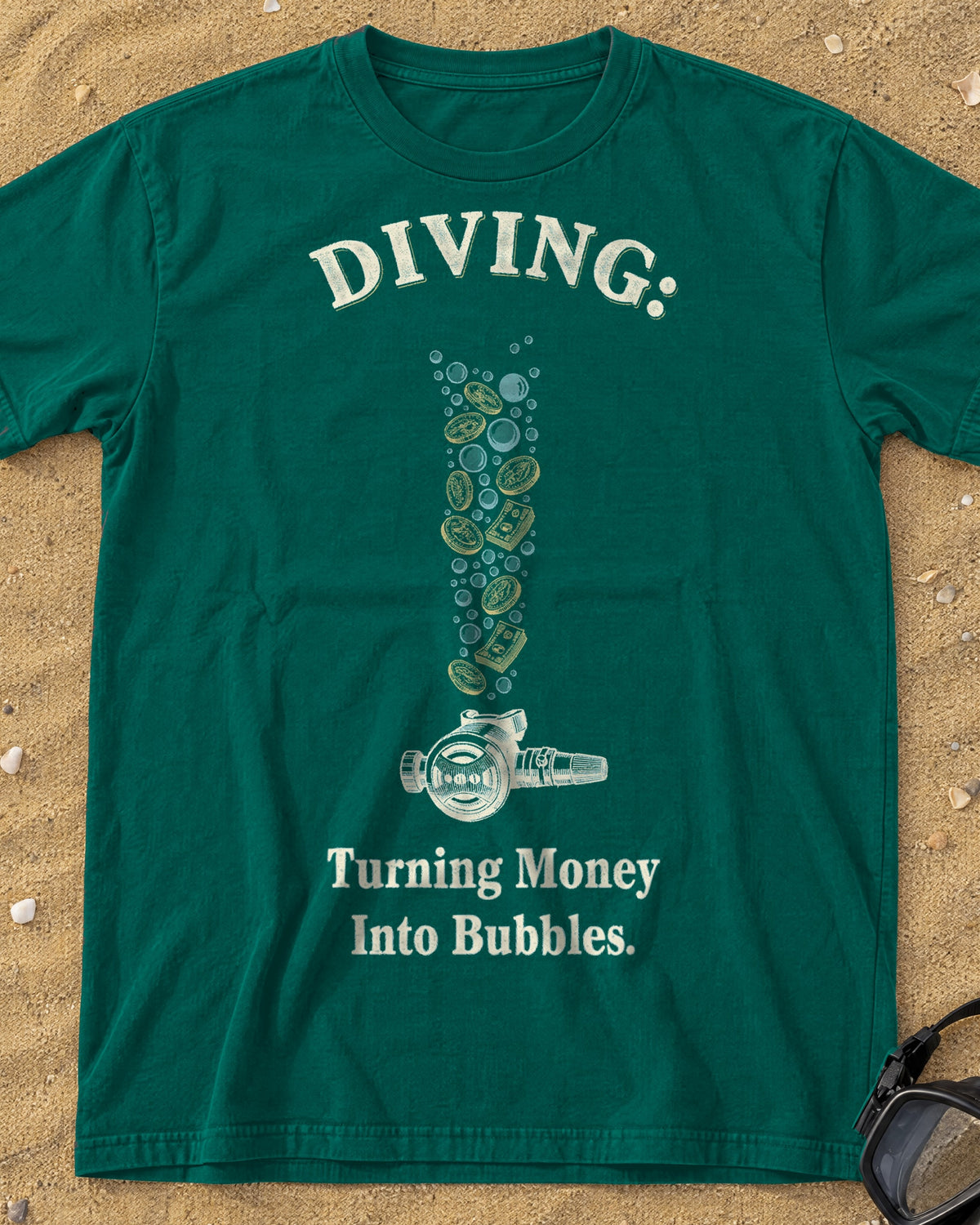 Blue Spruce Diving: Turning Money Into Bubbles tee on a sandy beach