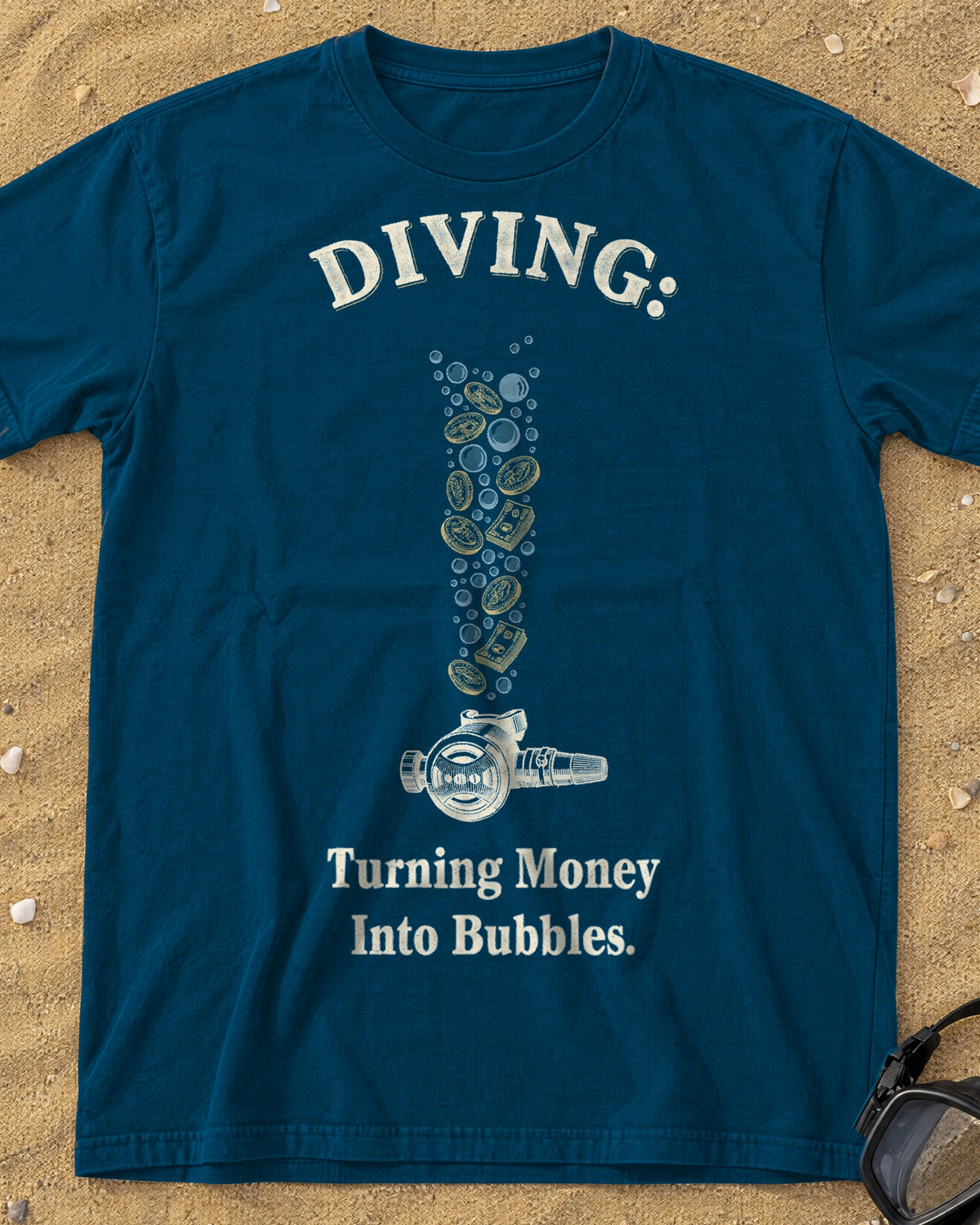 Denim Diving: Turning Money Into Bubbles tee on a sandy beach