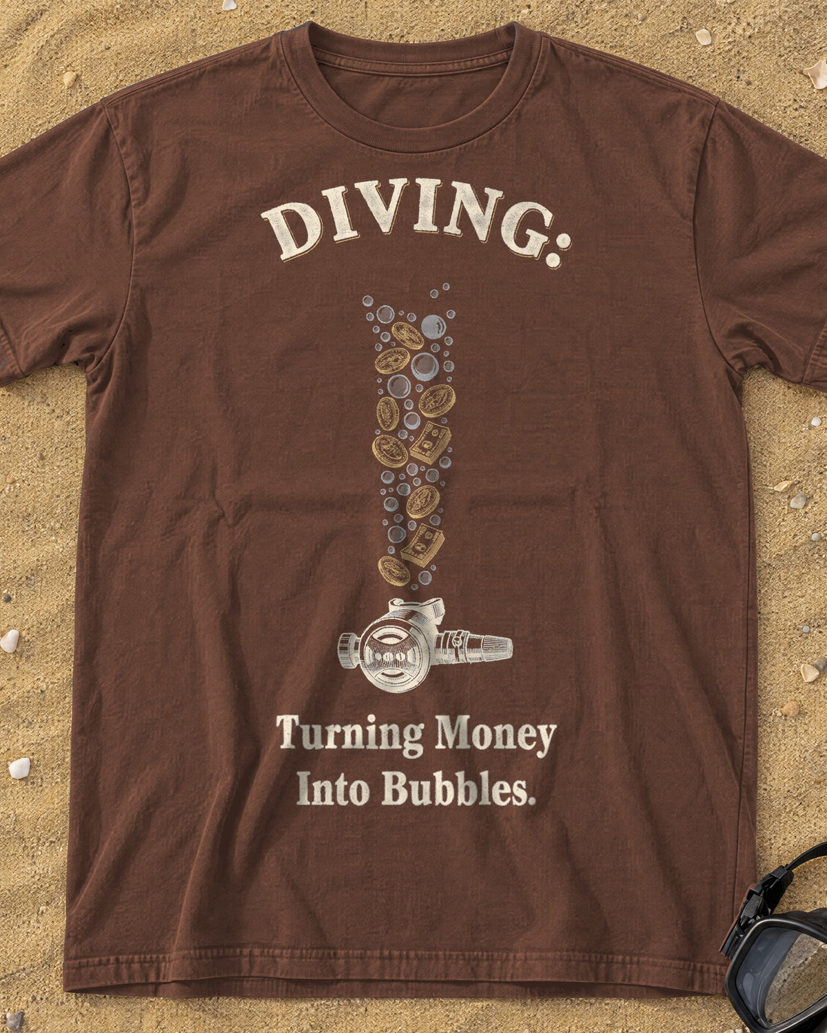 Espresso Diving: Turning Money Into Bubbles tee on a sandy beach