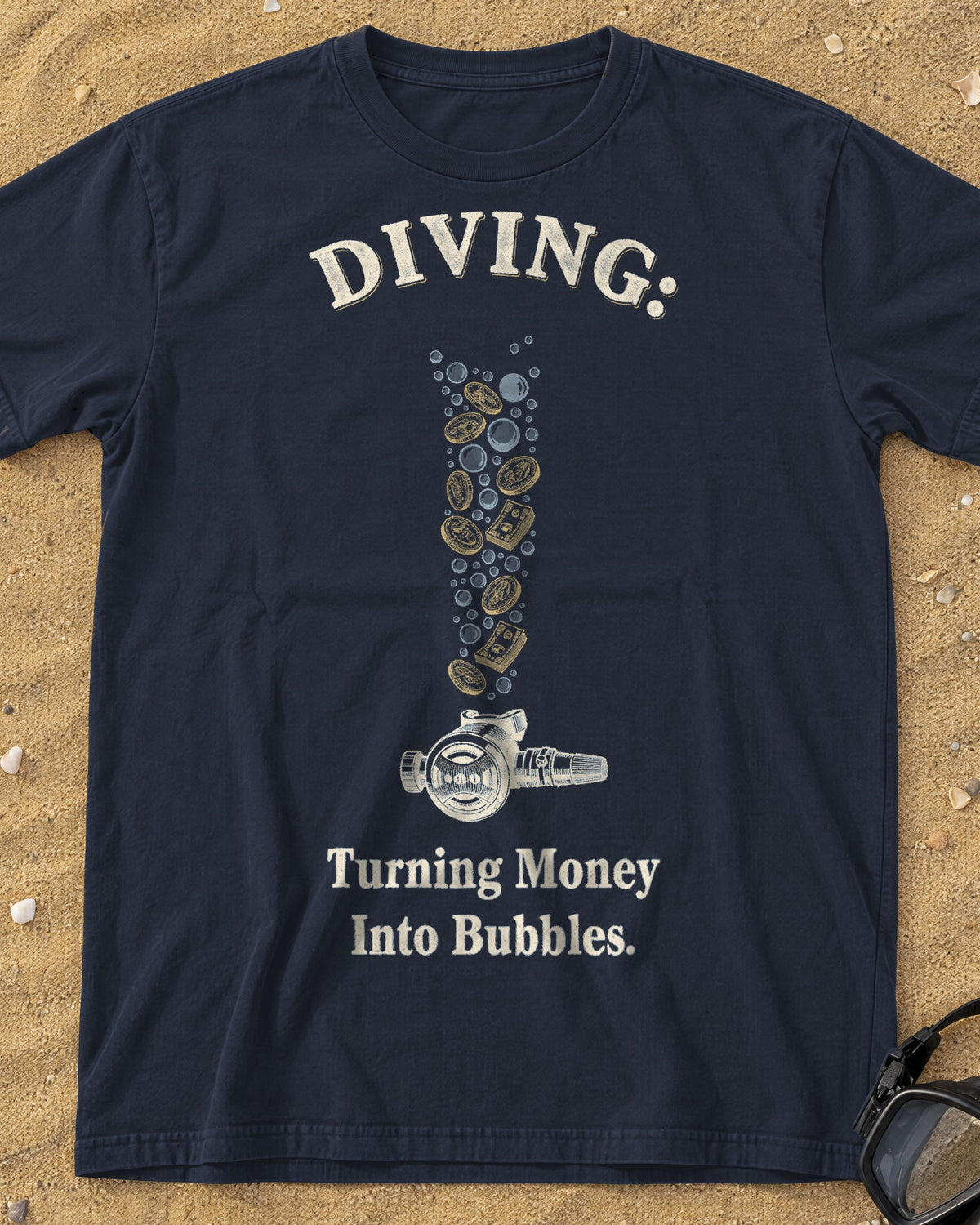 True Navy Diving: Turning Money Into Bubbles tee on a sandy beach