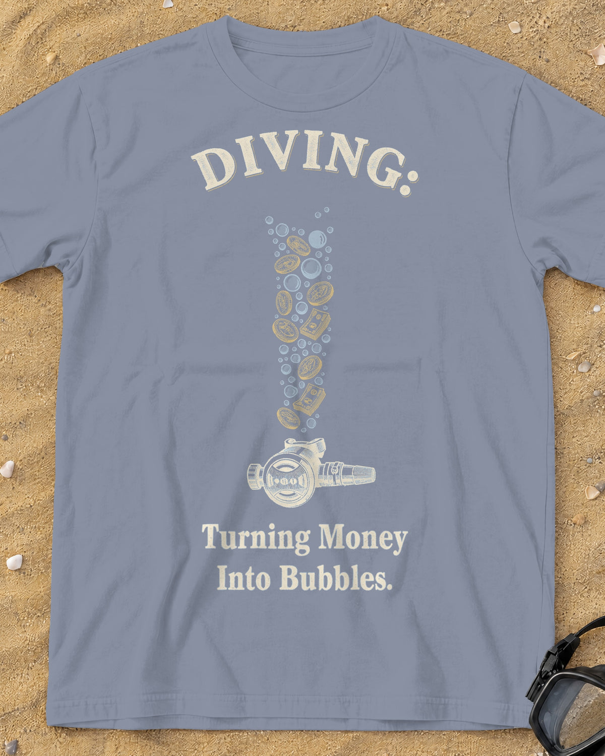 Washed Denim Diving: Turning Money Into Bubbles tee on a sandy beach